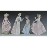 Four Lladro figurines, tallest 25cm