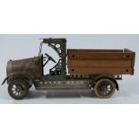 Meccano or Butcher & Sons Primus model of a lorry, made using green, unpainted and wooden parts,