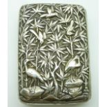 Chinese white metal cigarette case by Wang Hing, with embossed decoration of birds in bamboo, 8.5