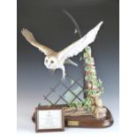 Royal Worcester limited edition no 5/100 Barn Owl modelled by David Fryer, the owl flying from