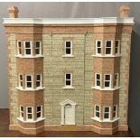 A scale model dolls' house, believed to be a replica of Linden House, Gorsley, Gloucestershire, with