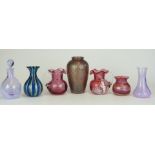 Seven pieces of coloured and iridescent glass comprising Okra and Royal Brierley vases, a pair of