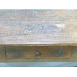 Rustic farmhouse style side table with single drawer below a two plank top, raised on square