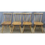 Four Ercol light elm comb back chairs