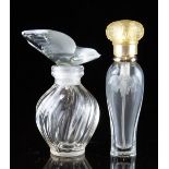 Two Lalique for Nina Ricci L'Air du Temps glass scent bottles, one with dove in flight stopper the