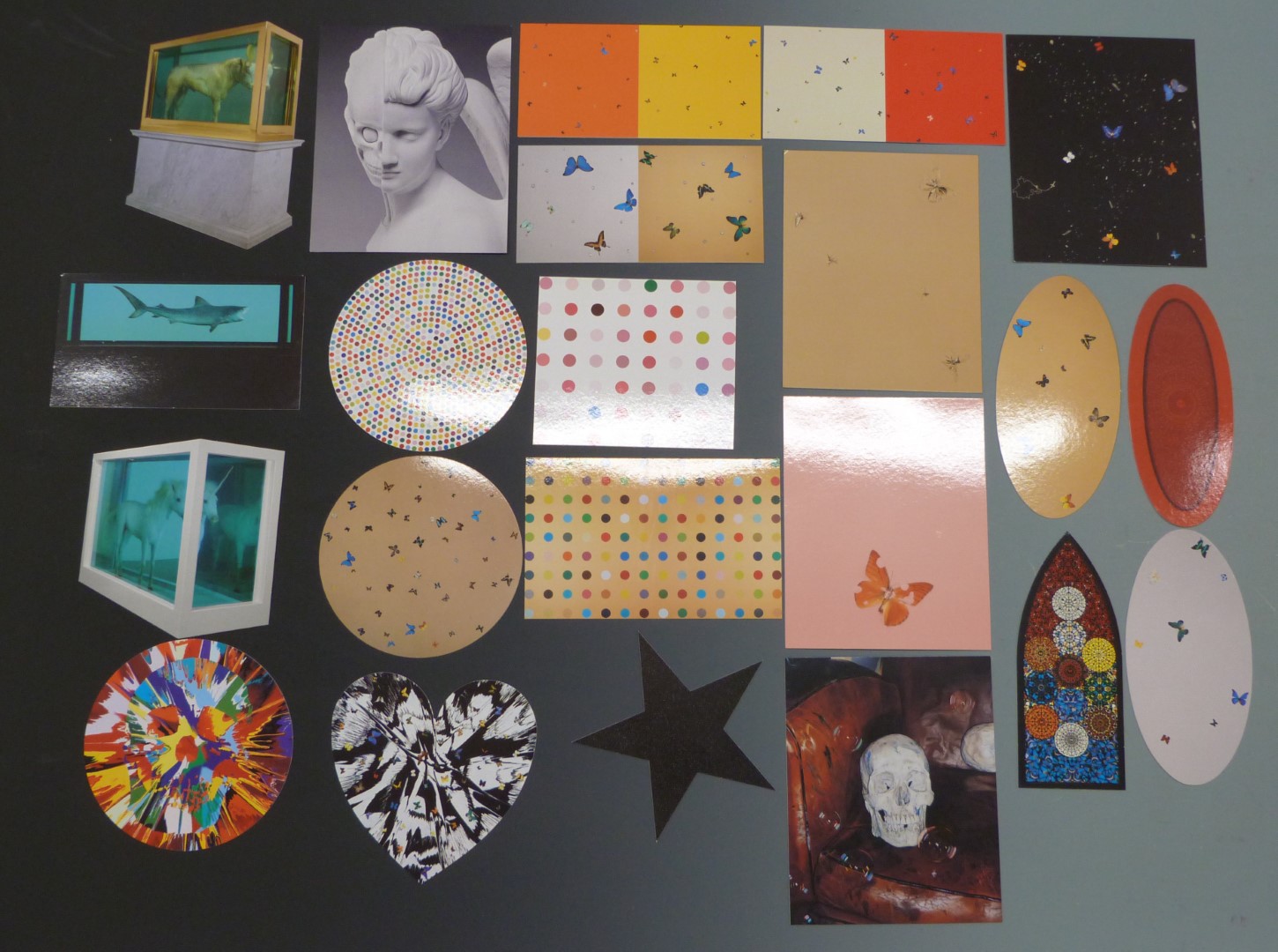 A collection of Damien Hirst ephemera, prints/ photographs on branded Hirst heavy card, includes