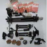 Manfrotto 190B camera tripod together with two 143 arms, two Leitz heads, Manfrotto parts etc