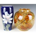 Royal Copenhagen vase with floral decoration, H17cm, and a Royal Doulton vase with autumn leaf