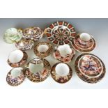 A collection of Royal Crown Derby Imari 2451 and 1128 pattern teaware, Copeland Imari teaware,