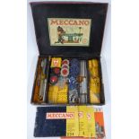 Meccano Outfit 4 with blue, yellow and gold parts, in reproduction box with instructions.