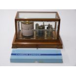 Oak cased barograph, with thermometer, under hinged bevelled glass cover with drawer below, W 36 x D