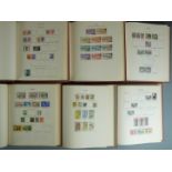 Six New Age Commonwealth QEII stamp albums, mainly used stamps