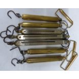 Four Abbot Birks Salter fish weighing or similar spring balances together with three examples with