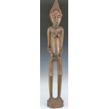 African tribal Yoruba carved fertility / maternity figure of elongated form, H72cm
