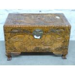 Small Chinese camphorwood chest with carved decoration, W51cm