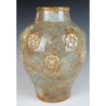 Royal Doulton art pottery vase with relief moulded floral decoration, signed Maud Bowden, H20.5cm