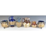 Six Royal Doulton and Doulton Lambeth jugs, cauldrons, vase and ewer, includes a hallmarked silver