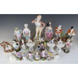 A large collection of 19th/20thC continental figures, mainly German including Dresden lace,