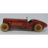 Mettoy clockwork tinplate racing car with red body, white 'Dunlop Fort' tyres and raving number 7,