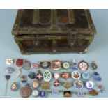 A collection of badges including Dan Air, National Union of Agricultural Workers, Corgi Model