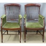 A pair of Victorian upholstered mahogany armchairs, H97cm