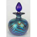 Okra iridescent glass scent bottle with pulled feather decoration over a cobalt blue ground, 10.