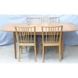 A Vanson retro table and four chairs, W132 x D89 x H74cm, extended 182cm