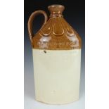 Doulton Lambeth stoneware spirit flask impressed J S Williams & Son, importers of wines and spirits,