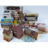 A collection of Faller, Wills and similar 00 gauge H0 scale model railway buildings, vehicles,