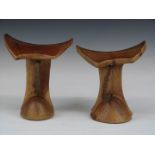 Two carved African tribal headrests with braided leather handles, Ileret, Latee Turkana region,