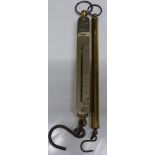 Two vintage car interest Salter spring balances, one calibrated in cans of petrol the other marked E