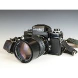 Minolta XM SLR camera with 135mm 1:2.8 lens