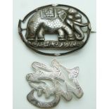 Chinese silver brooch by Wai Kee and a white metal brooch depicting an elephant