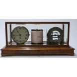 Hamilton and Inches barograph with integral clock, in an oak case with bevelled glass and single