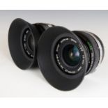 Two Olympus OM-system Zuiko Auto-W 28mm 1:2.8 camera lenses