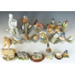 A large collection of ceramic figures including Lladro, Mack China birds, Beswick Ducks etc