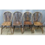 Two pairs of elm seated Windsor dining chairs