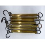 Seven cylindrical Salter spring balances comprising 28, 50, 60, two 80lb, 40kgs and 3kgs examples