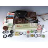 Leica camera accessories to include M3 to screw adaptor, 16469 converter, FIPOS in box, viewfinders,