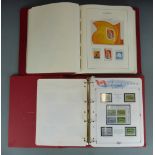 Two albums of mint QEII Canada stamps. Includes many blocks and mini sheets. High face value