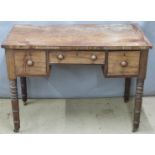 19thC mahogany desk fitted three drawers and raised on turned legs, W101 x D53 x H72cm