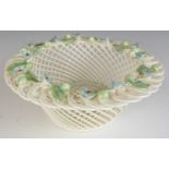 Belleek porcelain basket with applied flower decoration, diameter 14.5cm