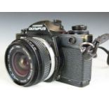Olympus OM-3 SLR camera with 28mm 1:2.8 lens