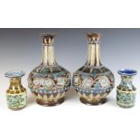 Two pairs of Doulton Lambeth vases with incised signatures, the tallest pair H24cm