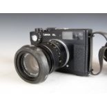 Leica CL 35mm camera, serial number 1305322, with Elmar-C 1:4/90 lens