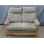 Two two seat sofas with light oak or similar frames, W128cm