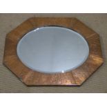 A copper framed Arts and Crafts style octagonal mirror, W67cm