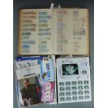 A box file of mint Canada QEII stamps, singles and blocks on loose Hagner sheets, together with a