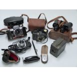 Collectable cameras to include Zeiss Ikon Box Tengor, 1943 6x30 M3 military binoculars in case,