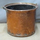 A 19thC rivetted copper bucket, diameter 40, H35cm